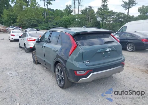 2025 Kia Niro Sx Touring z USA, uszkodzony, nr VIN KNDCT3LE5S5214372